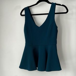Women’s deep green peplum top